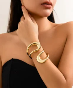 Bracciale rigido dorato donna