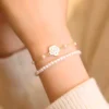 Bracciale fiore con perla Rosy