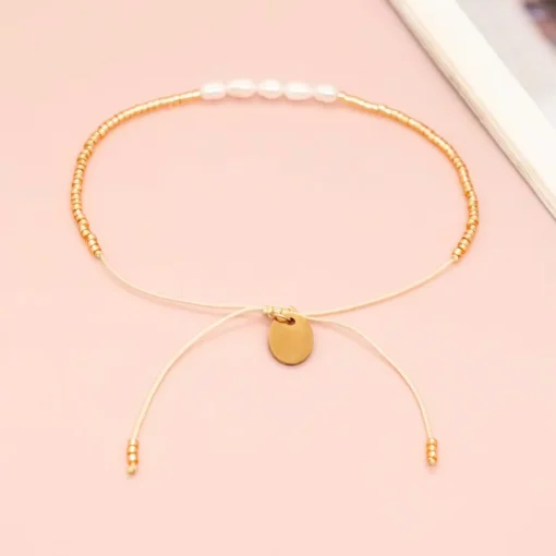 Bracciale con perle piatte Nessa - immagine 4