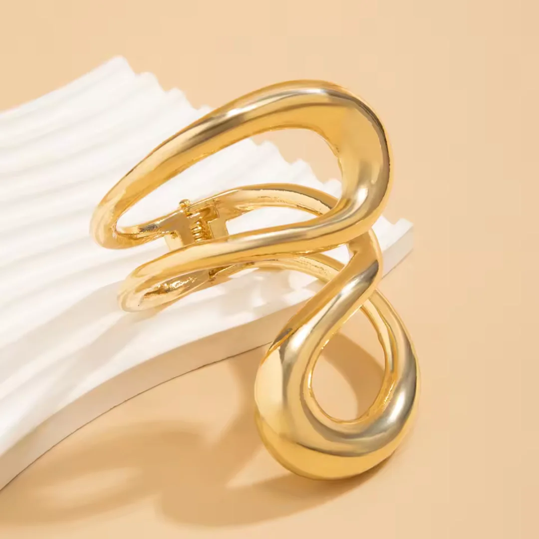 Bracciale rigido dorato donna - immagine 5